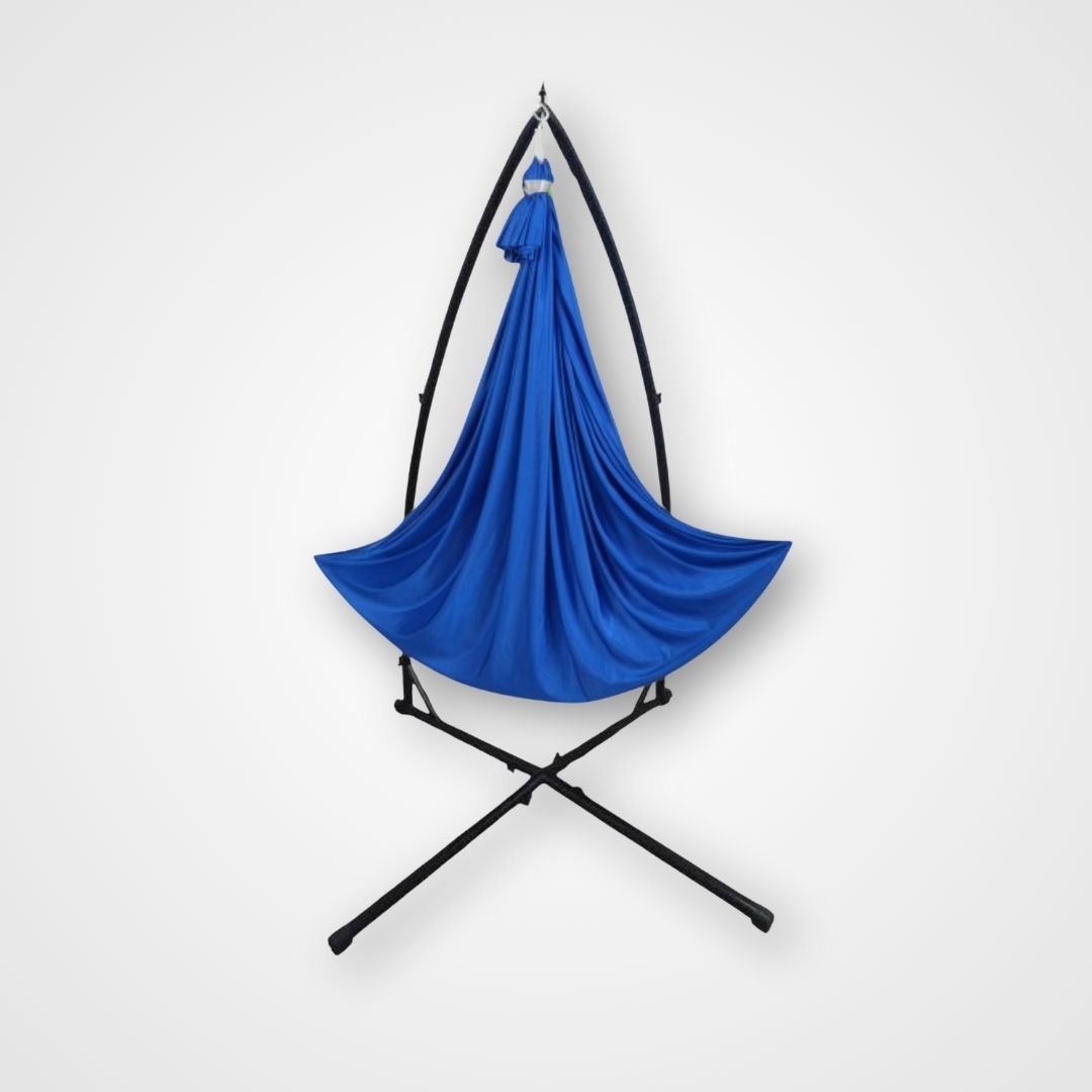 A blue therapy swing set with a freestanding frame, designed for indoor or outdoor use. Cocoon-style swing with freestanding frame in a therapy or playroom setting – therapy swing set for balance, relaxation, and emotional support.
