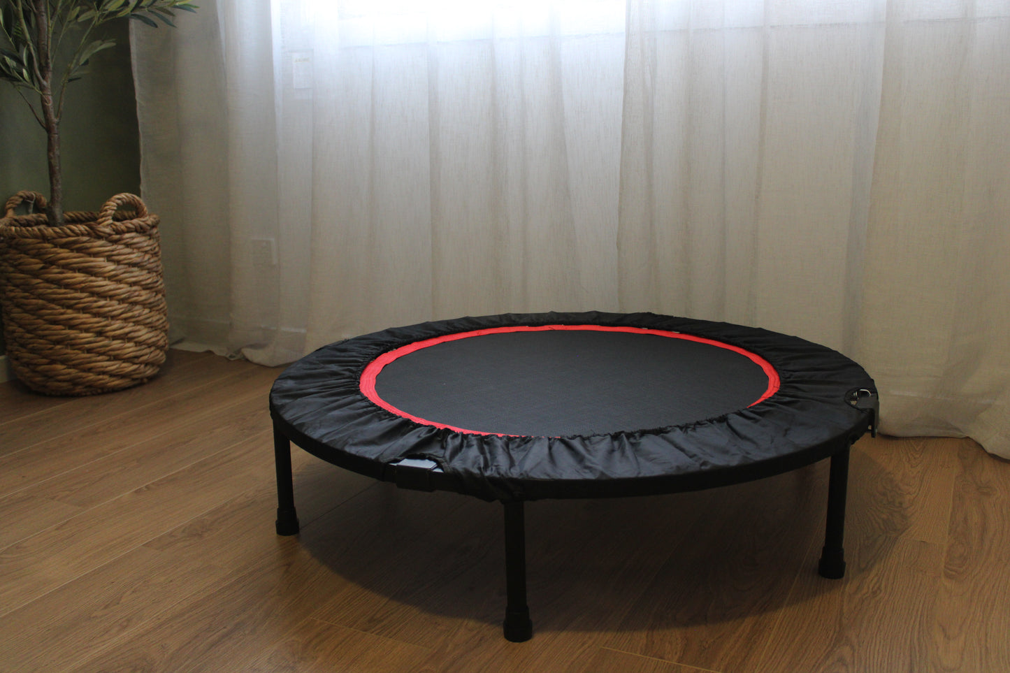 Therapeutic rebounder placed in playroom or therapy space – active support tool for physical development and focus.